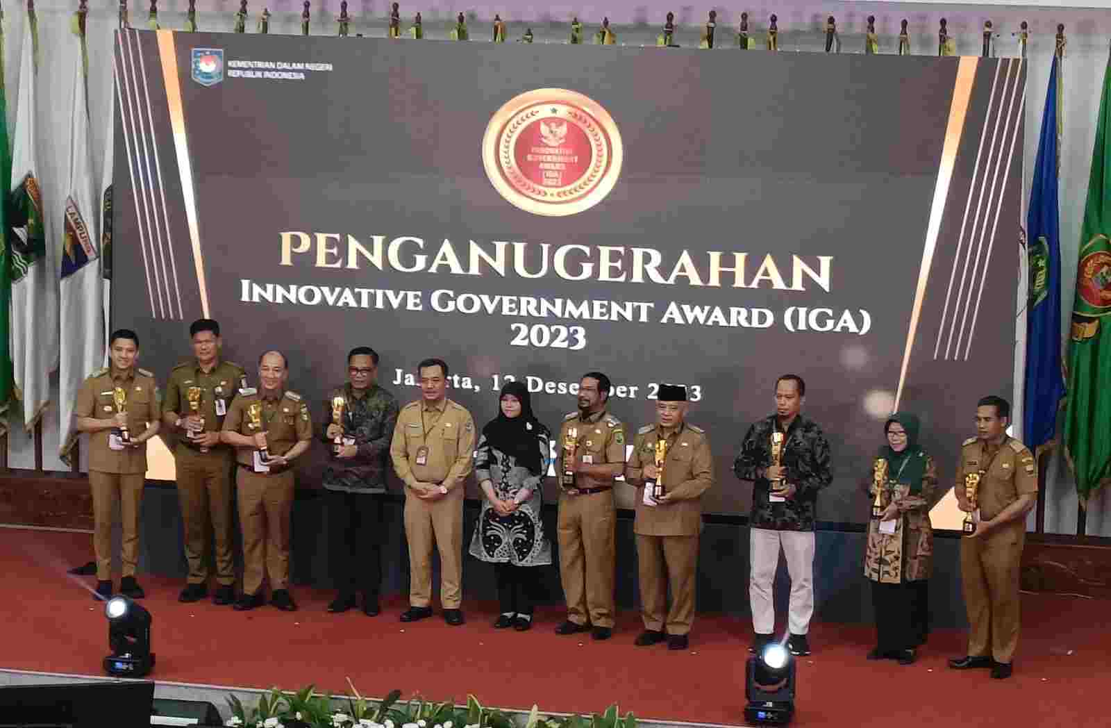 PJ Bupati Drs Qudratul Ikhwan Menorehkan Penganugerahaan Tinta Emas Melalui IGA 2023 PJ Bupati Drs Qudratul Ikhwan Menorehkan Penganugerahaan Tinta Emas Melalui IGA 2023