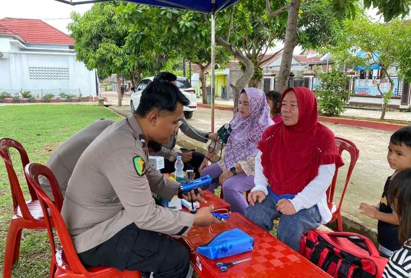 Polda Lampung Buka Posko Kesehatan bagi Korban Banjir Polda Lampung Buka Posko Kesehatan bagi Korban Banjir