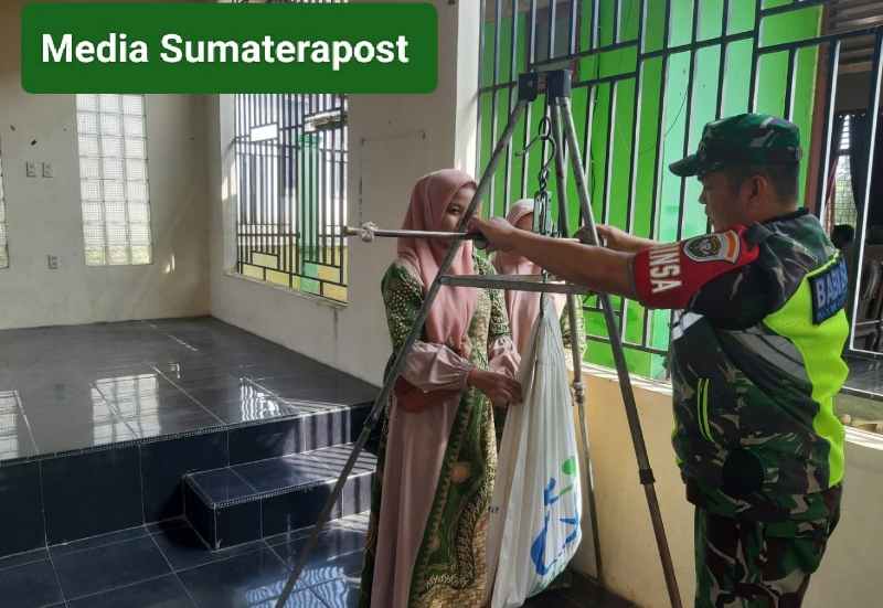 Bentuk Kepedulian Kesehatan Balita, Serka P.Ginting Dampingi Kegiatan Posyandu Bentuk Kepedulian Kesehatan Balita, Serka P.Ginting Dampingi Kegiatan Posyandu