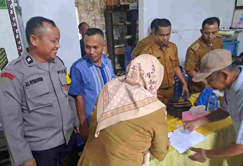 Bhabinkamtibmas Polsek Bosar Maligas Hadiri Penyaluran BLT Bhabinkamtibmas Polsek Bosar Maligas Hadiri Penyaluran BLT